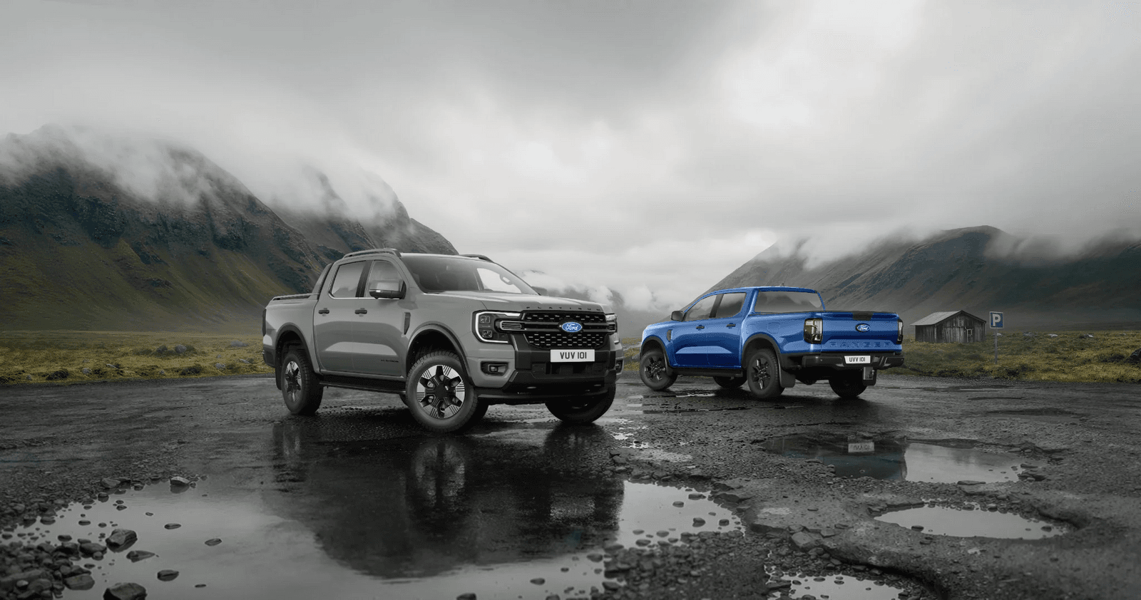 Ford Ranger Platinum und Limited PHEV 2026 in Front- und Heckansicht vor einer Berglandschaft